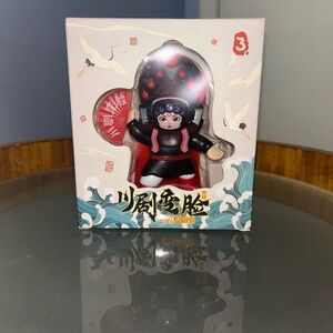 Kids Black and Red Toy Figure
